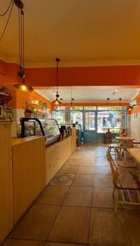 Warm and inviting café interior with rustic design in Muğla, Turkey.