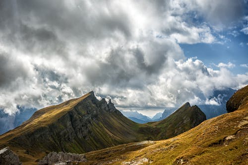 Rocky Mountains Under White Clouds