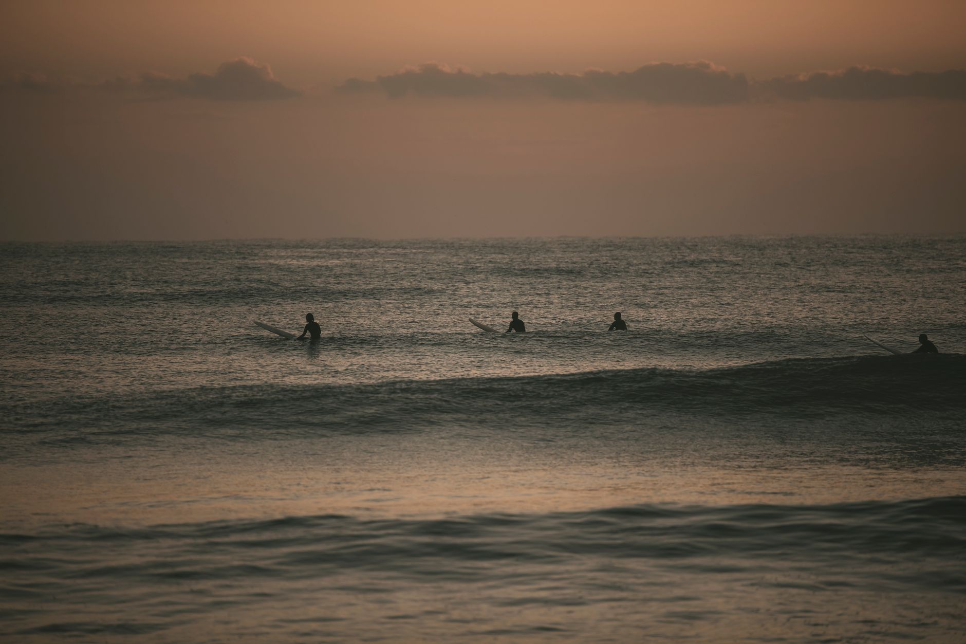 yangyang sunset surfers silhouette
