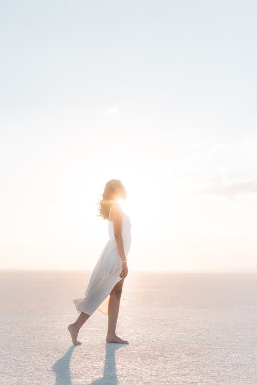 Sunlight behind Woman in Dress