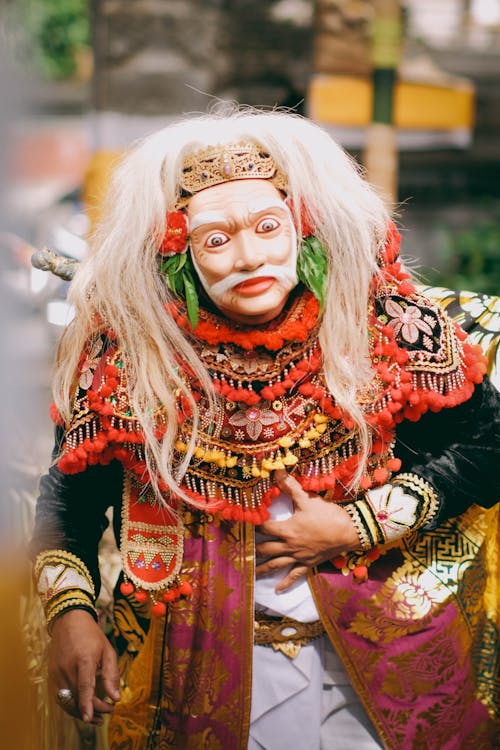 A Person Wearing Costume and Mask during the Topeng Sida karya Balinese Ceremony in Bali, Indonesia