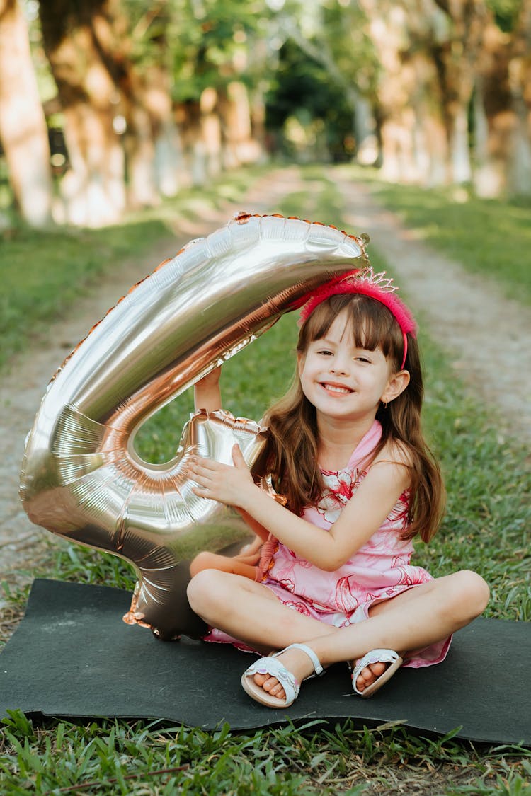 Happy Girl With Birthday Balloon