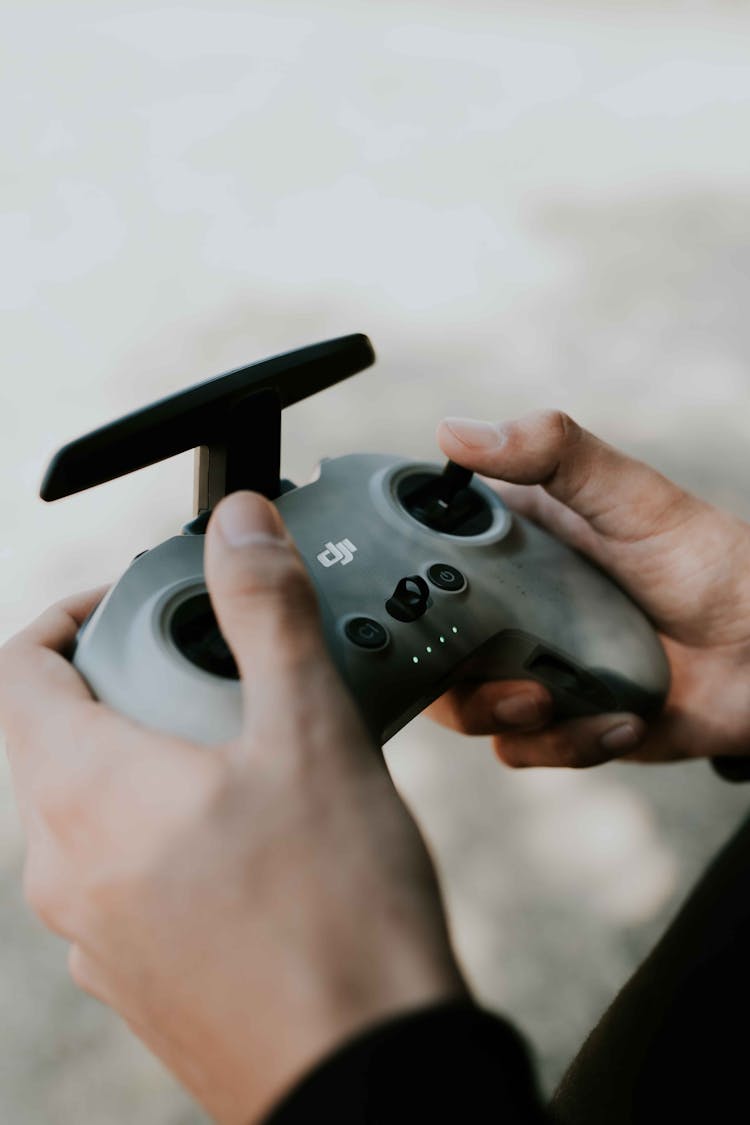 Man Hands On Controller