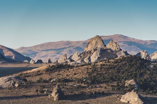 Free Breathtaking view of rocky formations under a clear blue sky, perfect for travel inspiration. Stock Photo