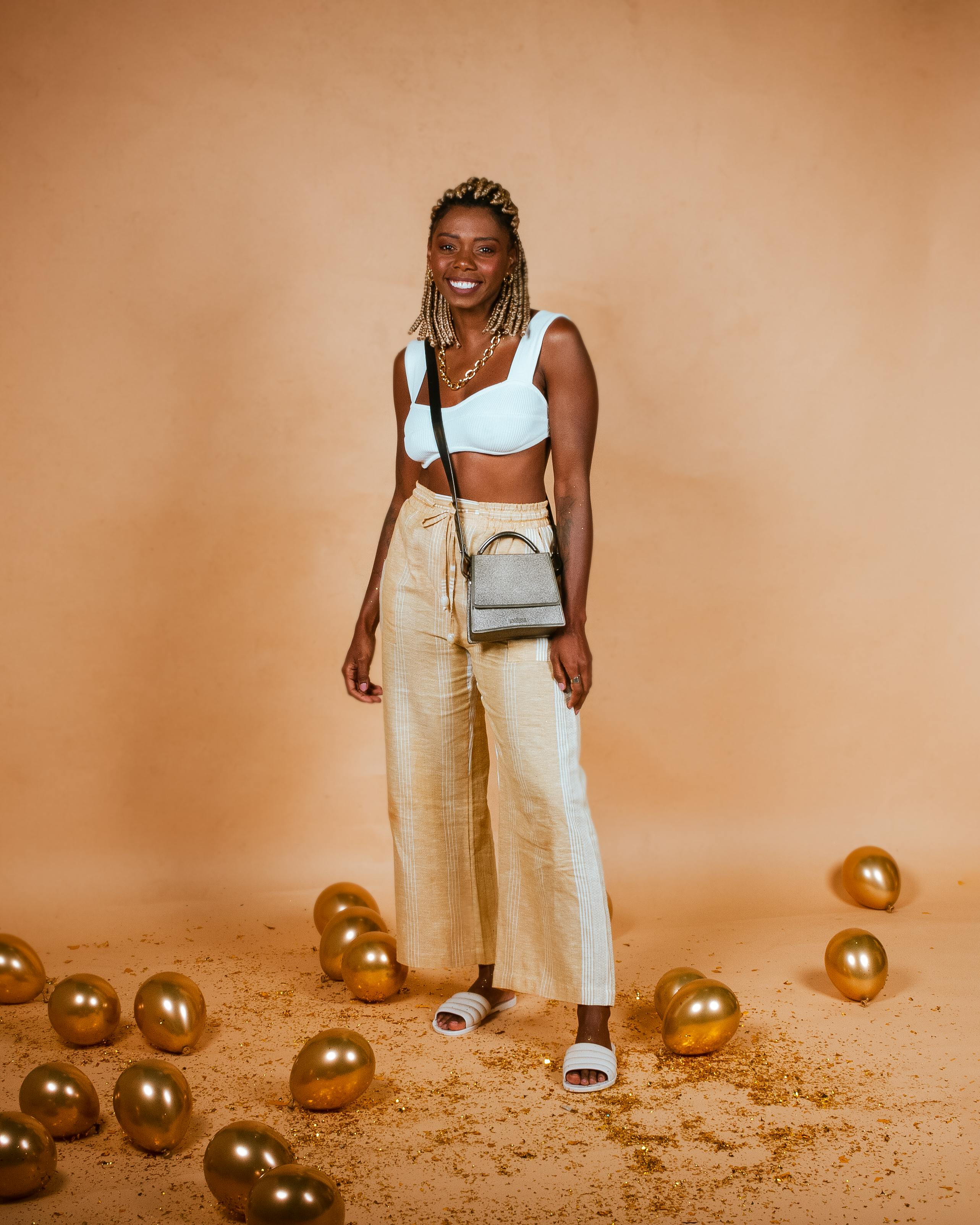 Woman in White Tank Top and Green Leggings Walking · Free Stock Photo