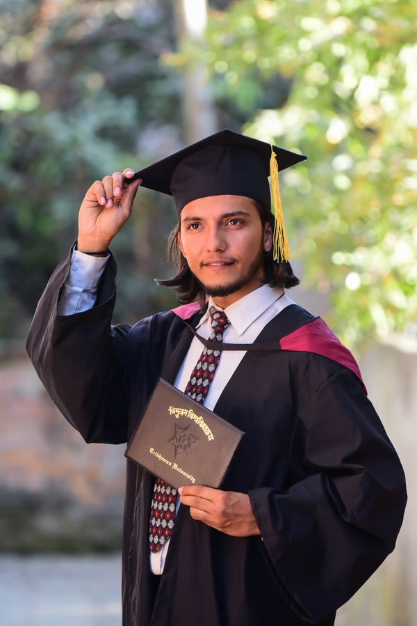 Man in Gown After Graduation · Free Stock Photo