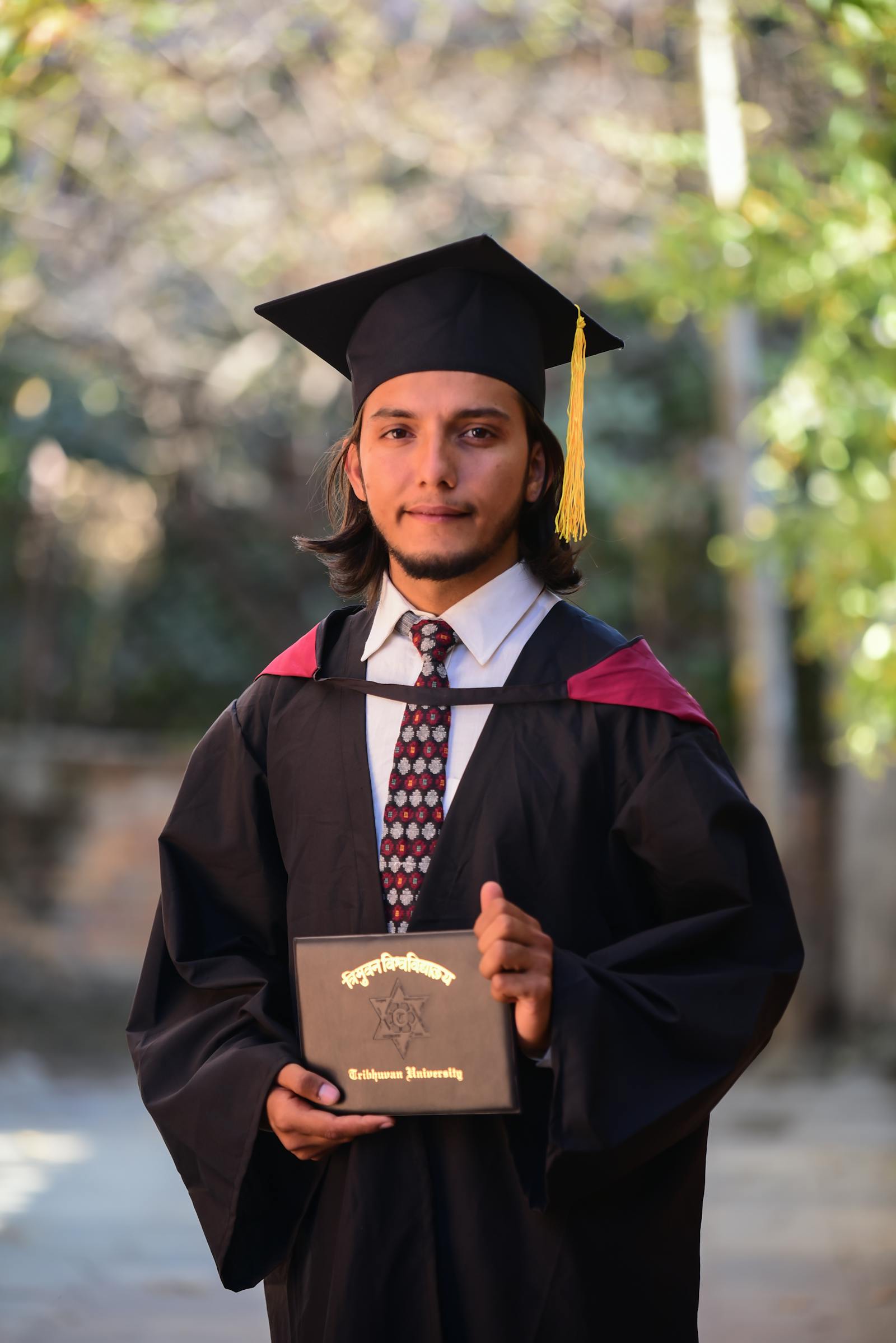 A Girl Wearing a Graduation Gown · Free Stock Photo
