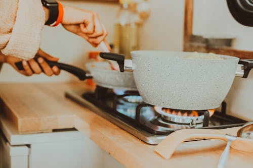 Woman Cooking in a Kitchen 