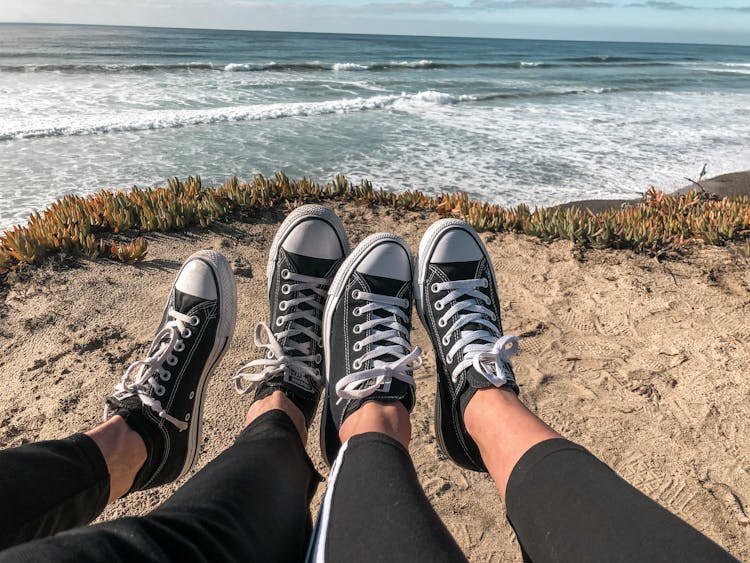 Matching Sneakers On Beach