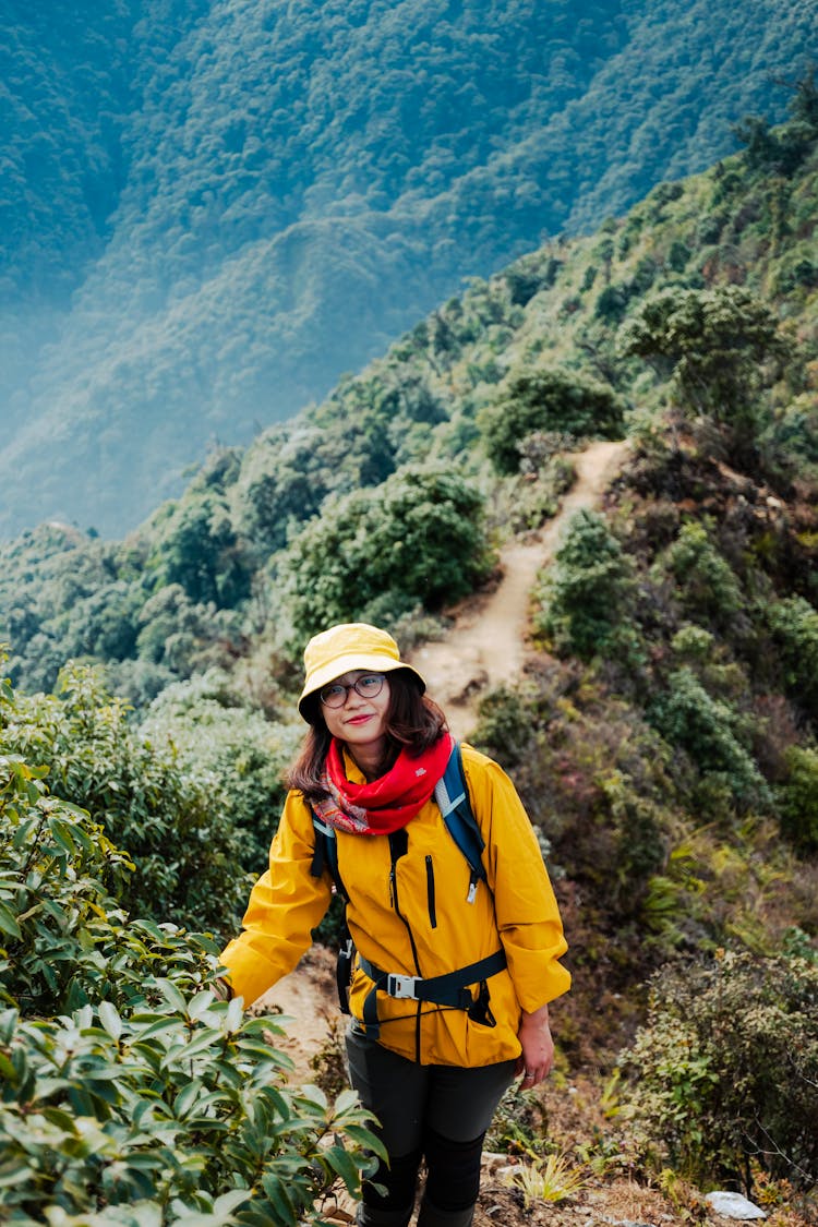 Woman Hiking In Mountains