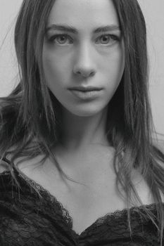 Stunning monochrome portrait of a woman showcasing elegance and sophistication.
