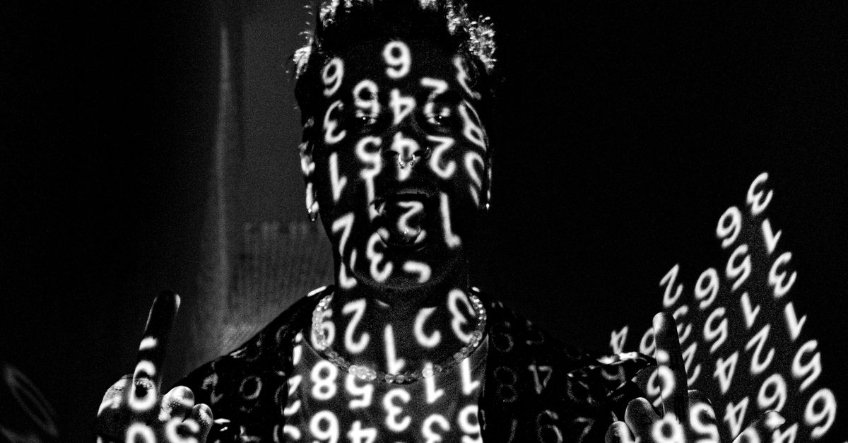A Dark Figure Wearing Costume with Inverted Numbers · Free Stock Photo