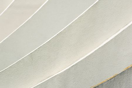 Curved stone wall in neutral tones — photo by Jan van der Wolf on Pexels
