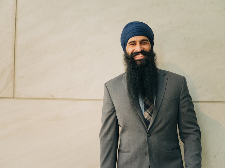 Smiling Businessman With Headscarf