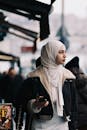 A Woman in White Hijab Looking to Her Left