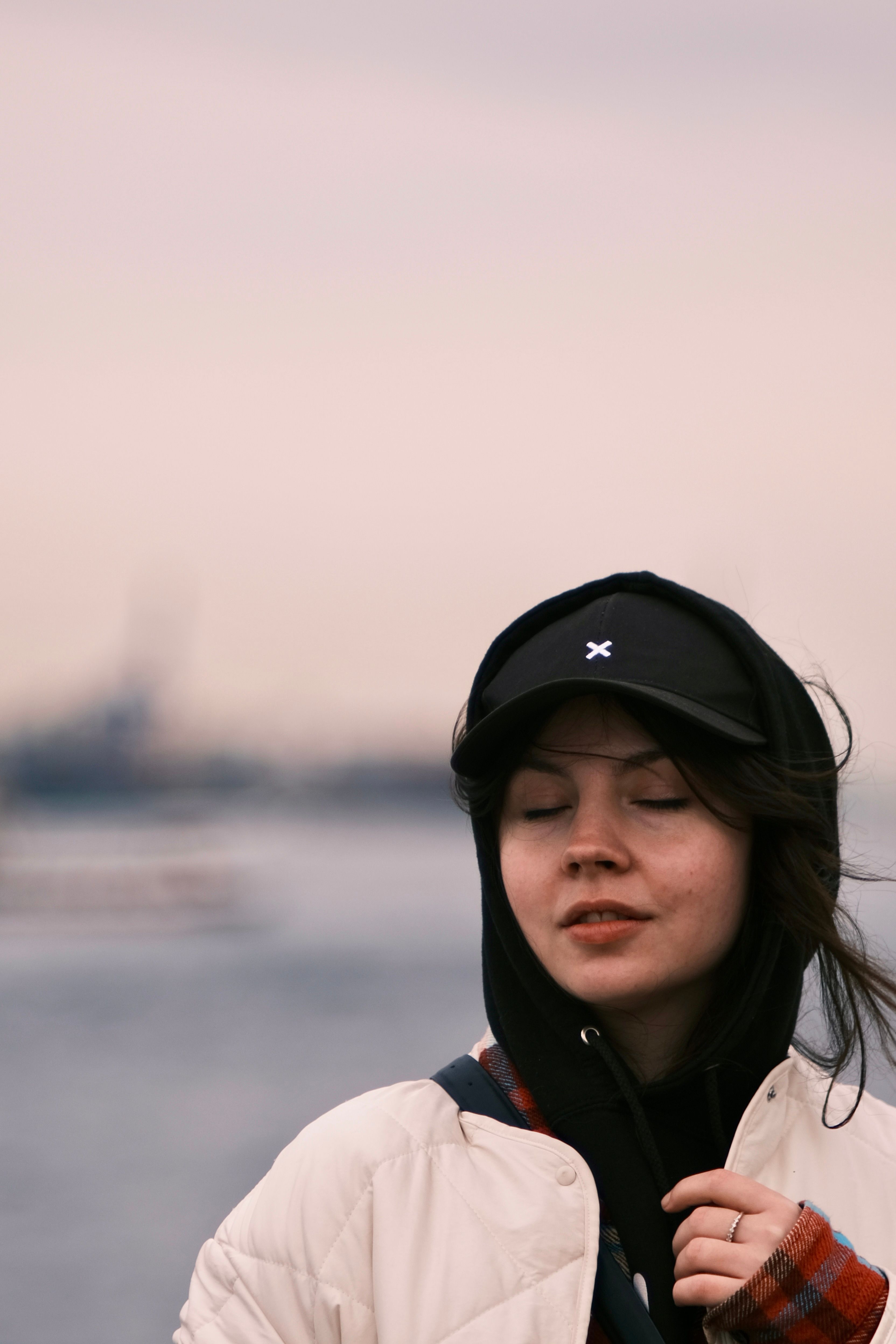 Portrait of a Woman with her Eyes Closed · Free Stock Photo