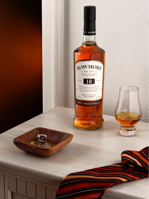 Alcoholic Bottle of Whisky on Sideboard