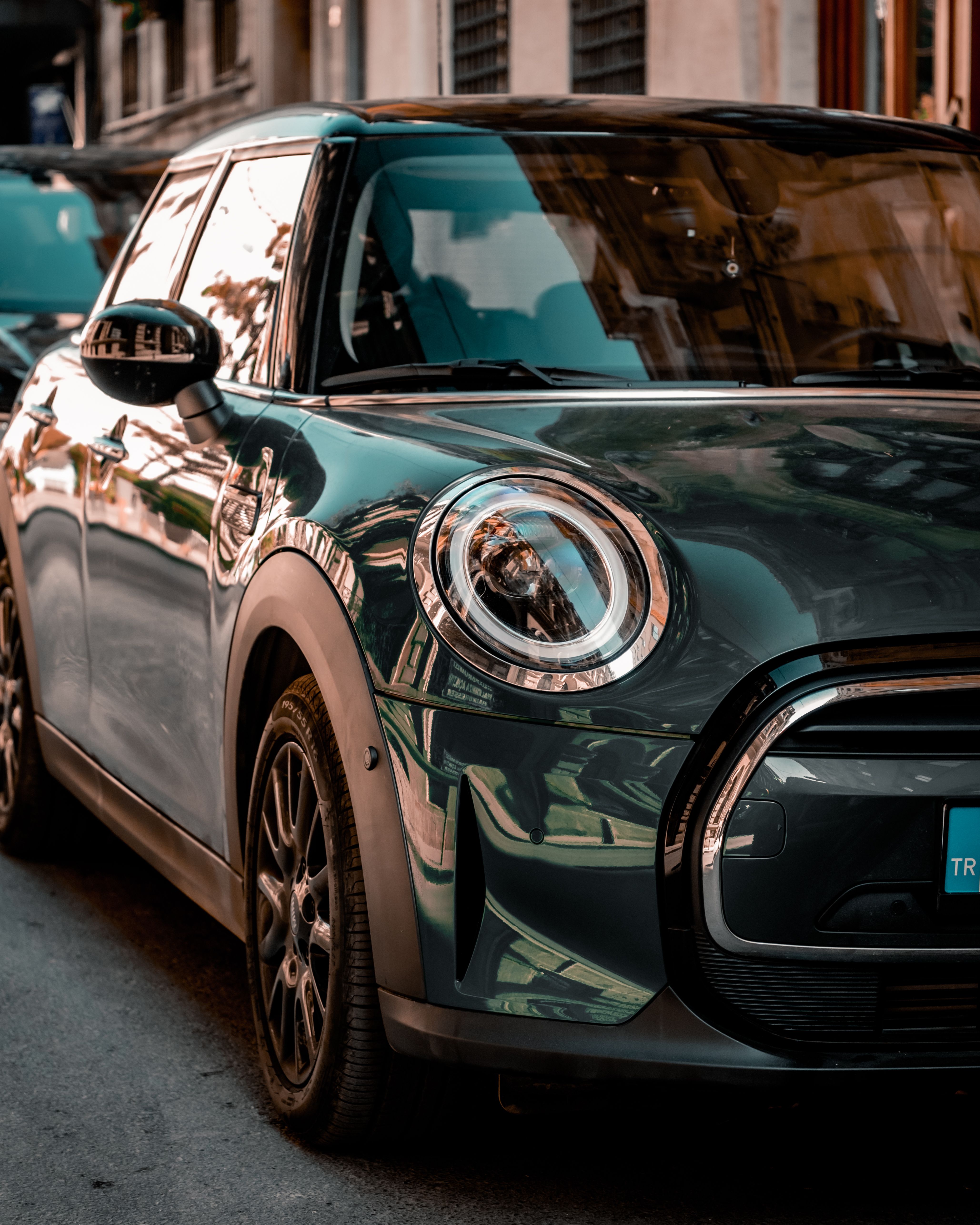 A BMW Mini Parked on the Side of a Street · Free Stock Photo