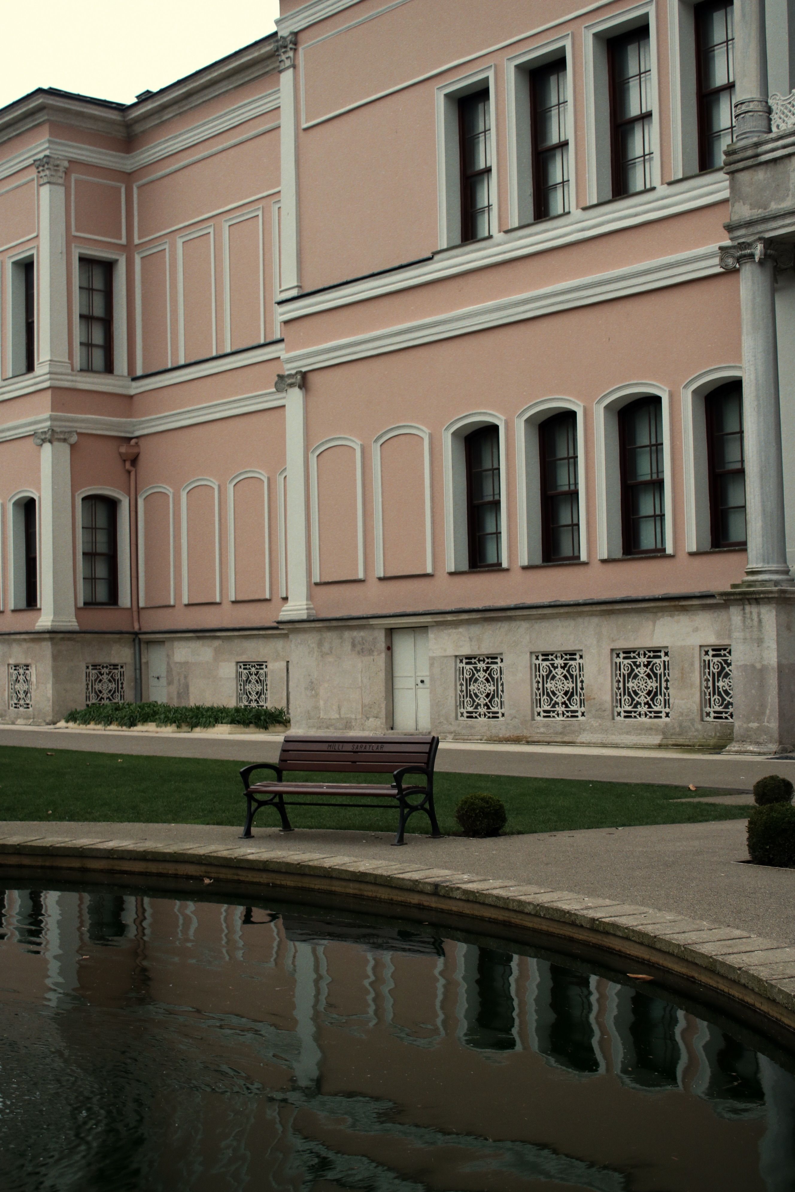 A Bench in Front of a Building · Free Stock Photo