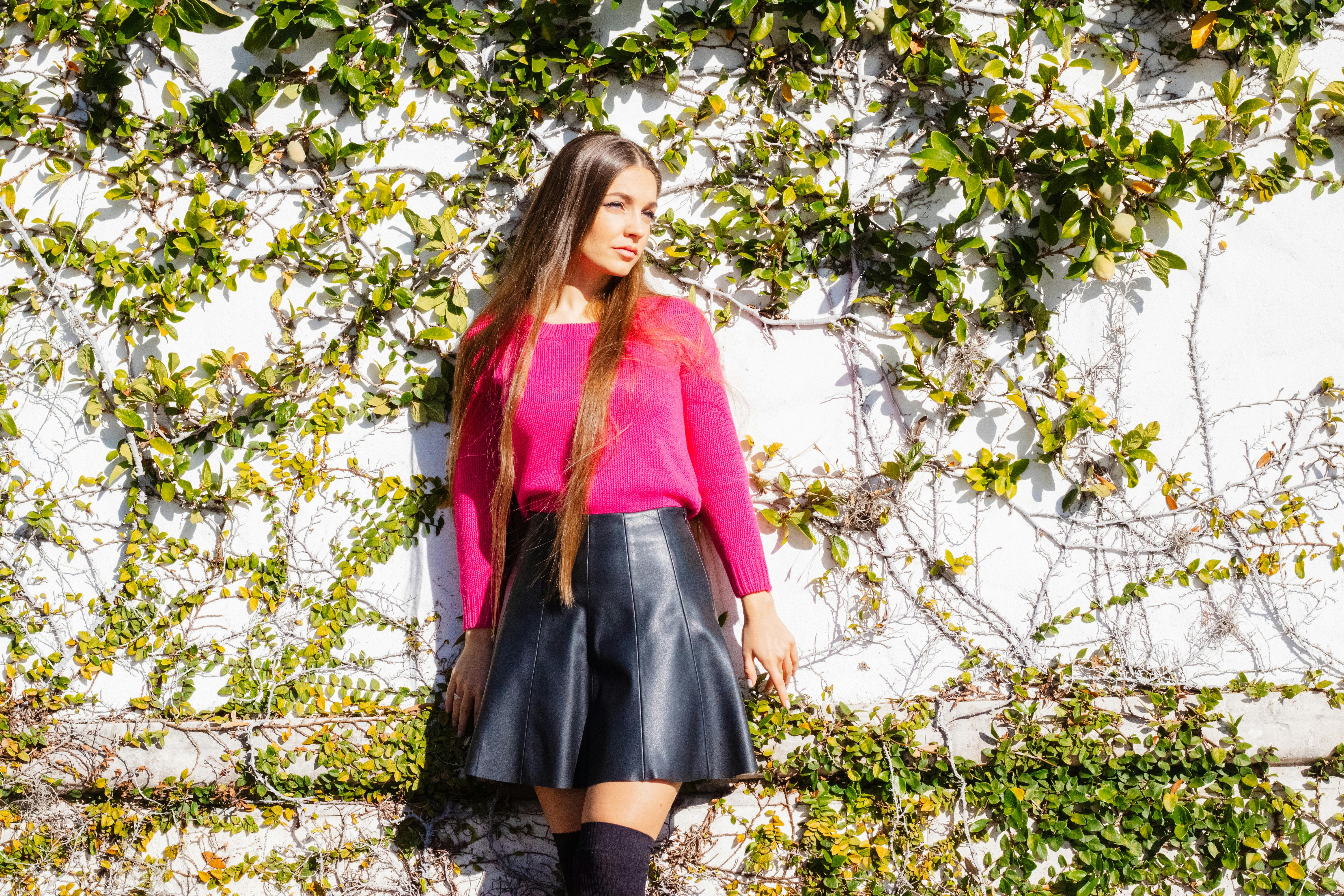 Woman Wearing Black and Red Long-sleeved Mini Dress and Red