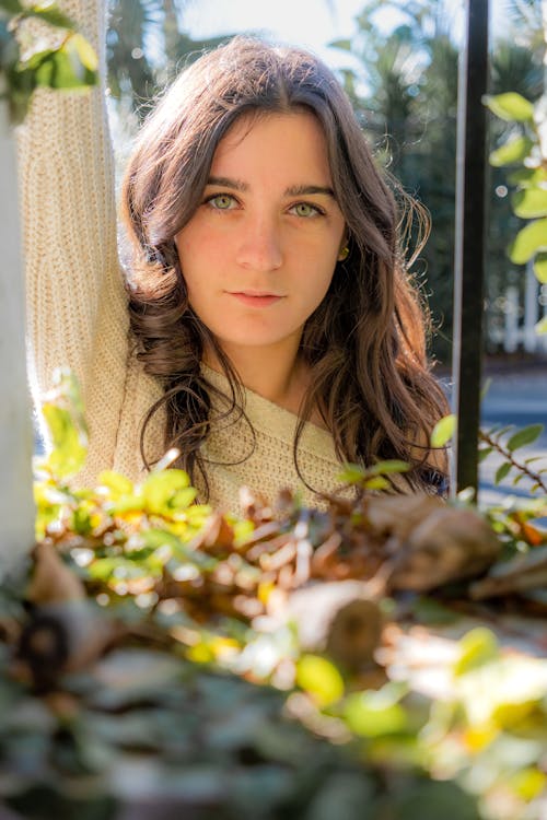 Young Brunette Posing Outdoors in Sunlight 