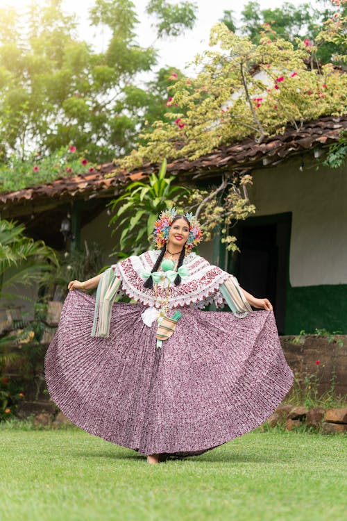 Woman Posing in Traditional Dress