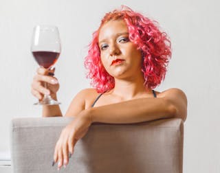 Woman Posing with Wine Glass