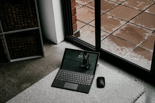Laptop on Carpet on Floor
