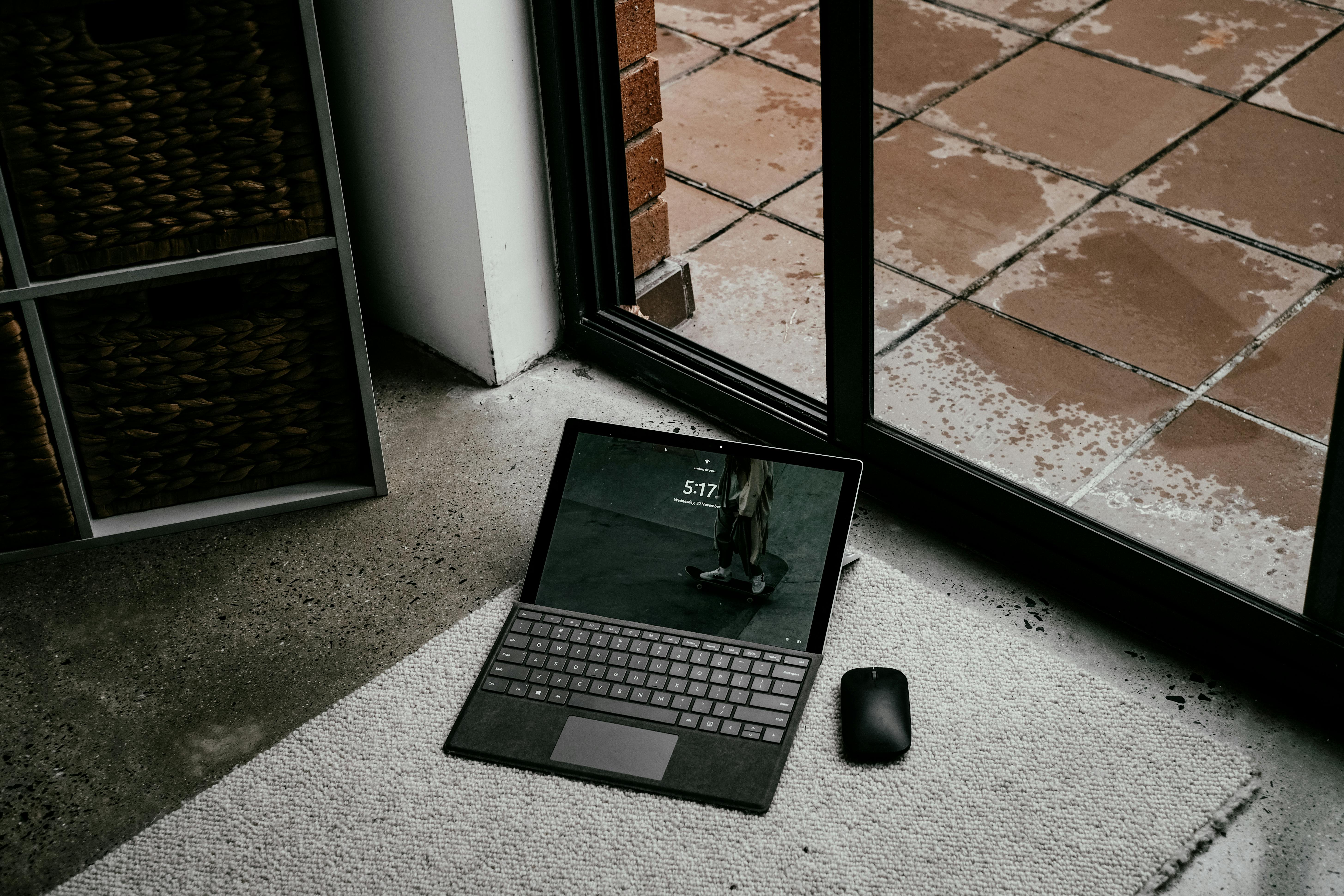 Laptop on Carpet on Floor · Free Stock Photo