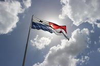 Panama flag waving proudly against a bright sky, symbolizing national pride.