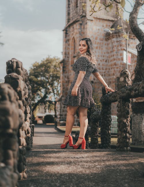 Woman Posing in front of Church