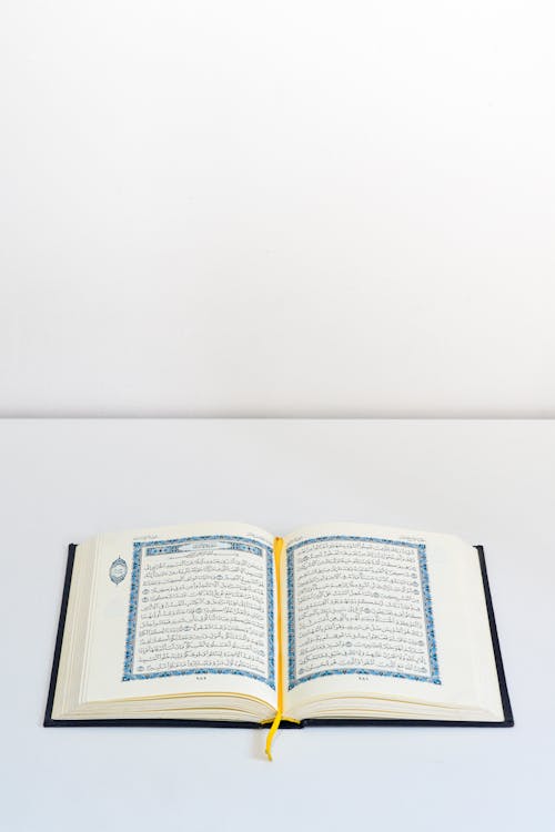 Open Quran with Yellow Bookmark