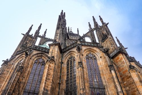 Free Explore the stunning Gothic facade of St. Vitus Cathedral, a landmark in Prague's historic architecture. Stock Photo