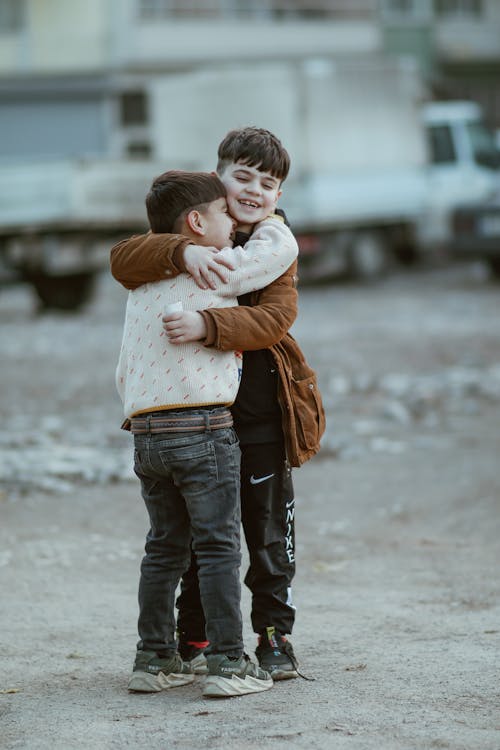 Two Boys Embracing