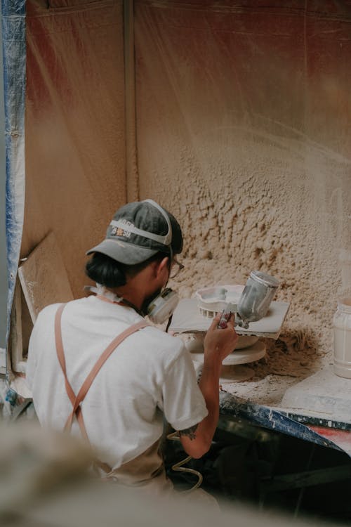 Artisan Making Clay Pottery