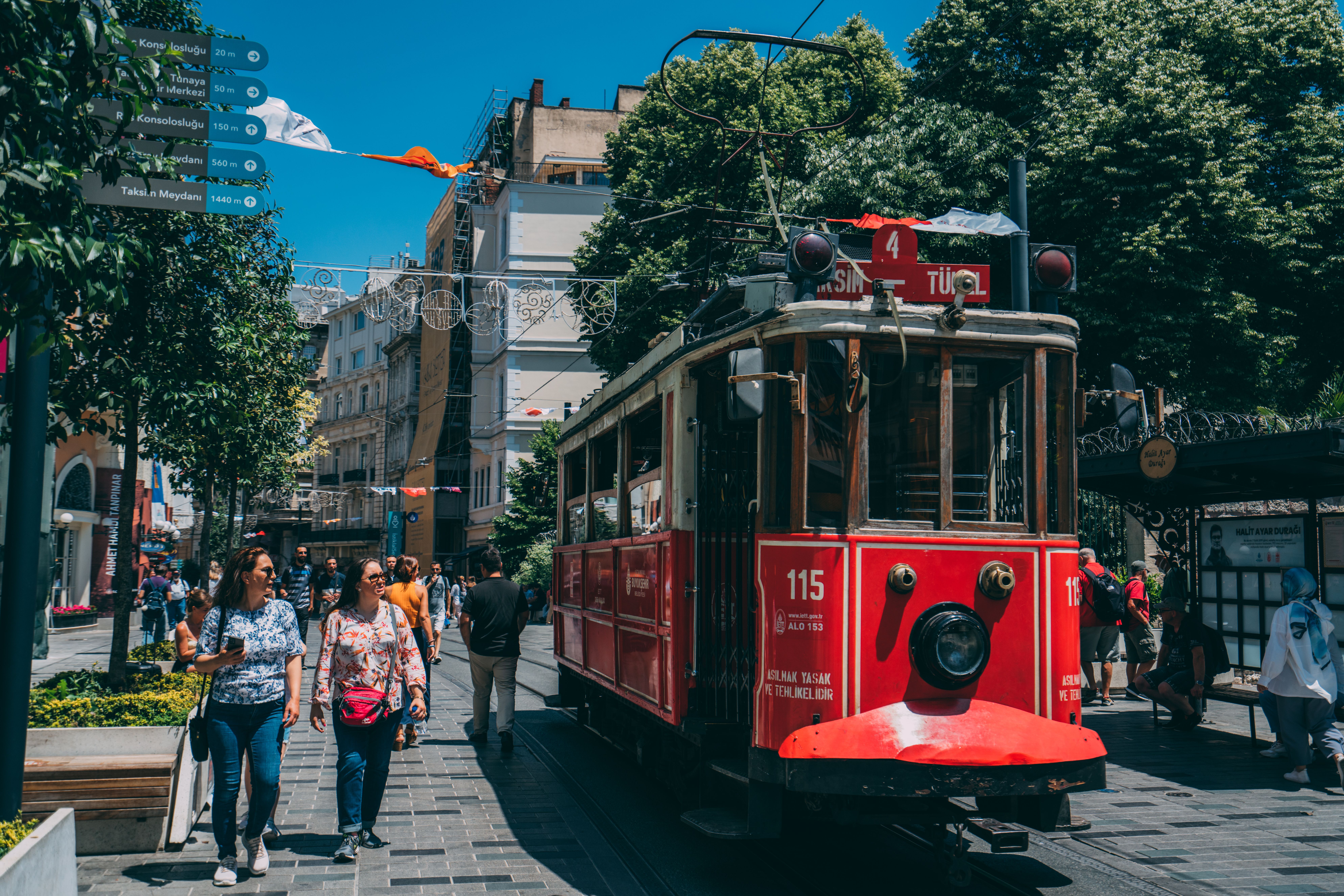 People Walking beside a Tram · Free Stock Photo