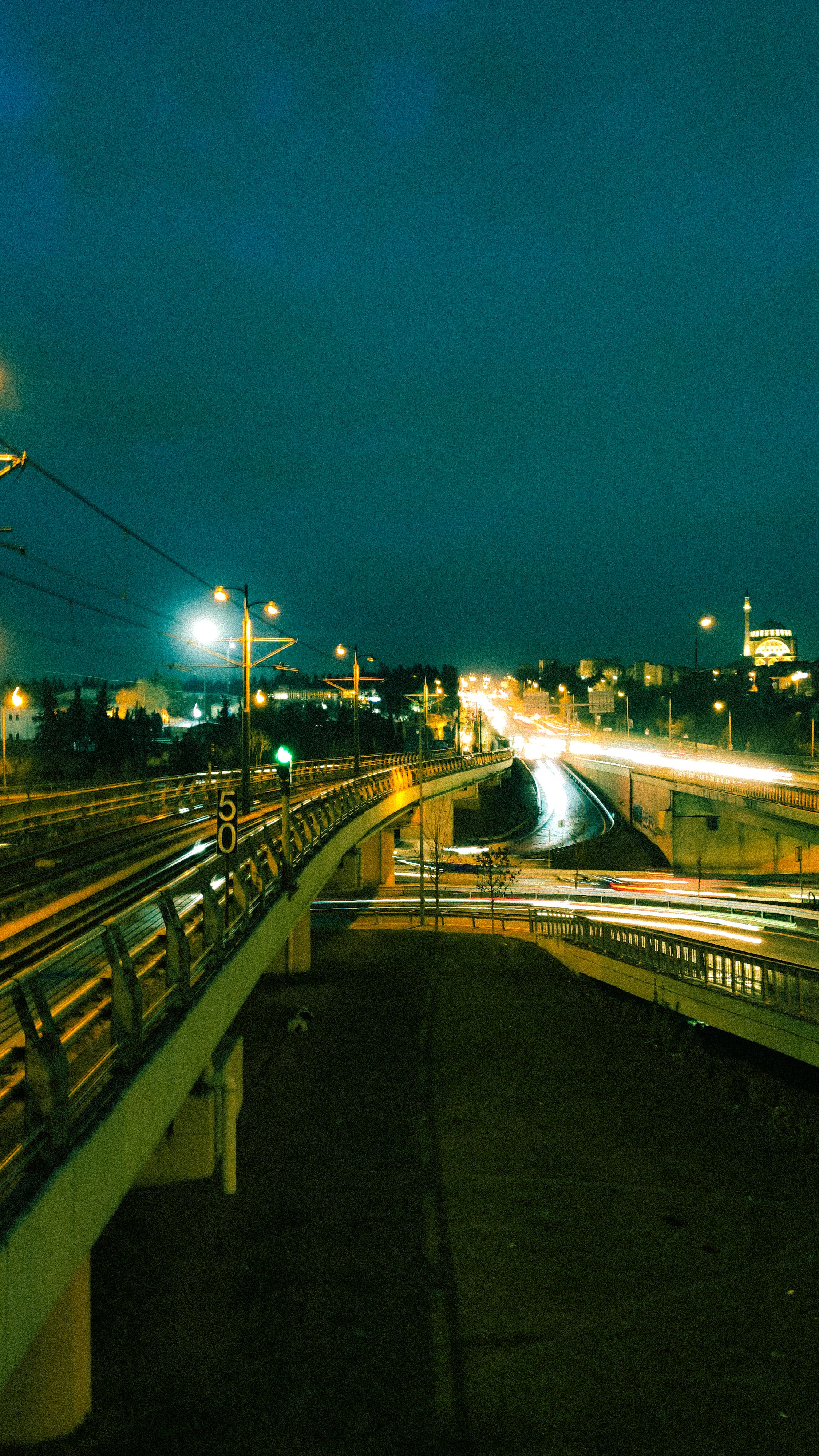 Long exposure shot capturing İstanbul's vibrant expressway at night with flowing car lights.. pexels, long, exposure