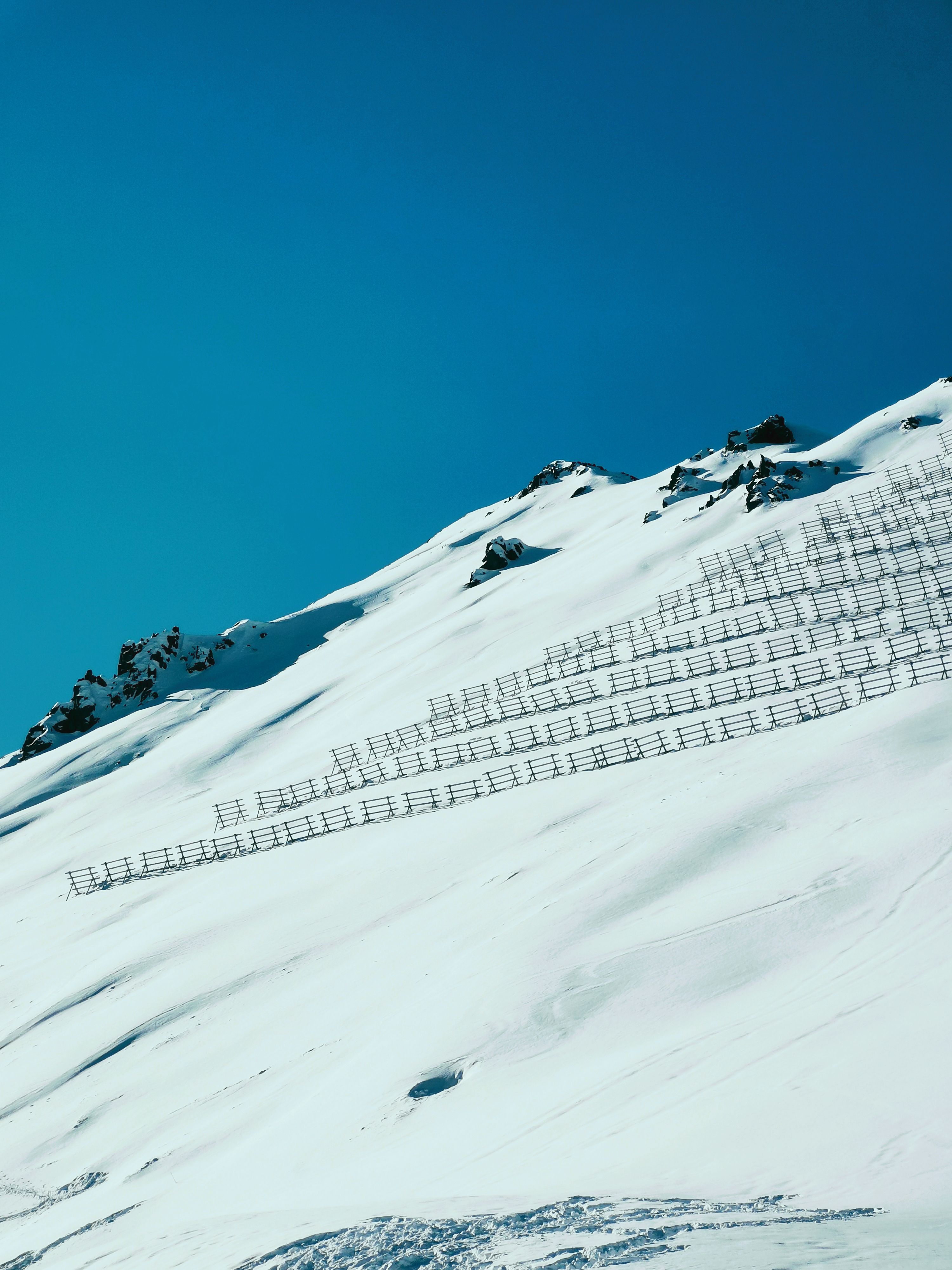 Snow Covered Mountain Under Blue Sky · Free Stock Photo