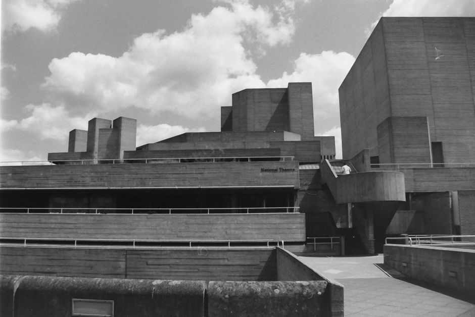 The Royal National Theatre's brutalist architecture in London captured in a striking black and white image.