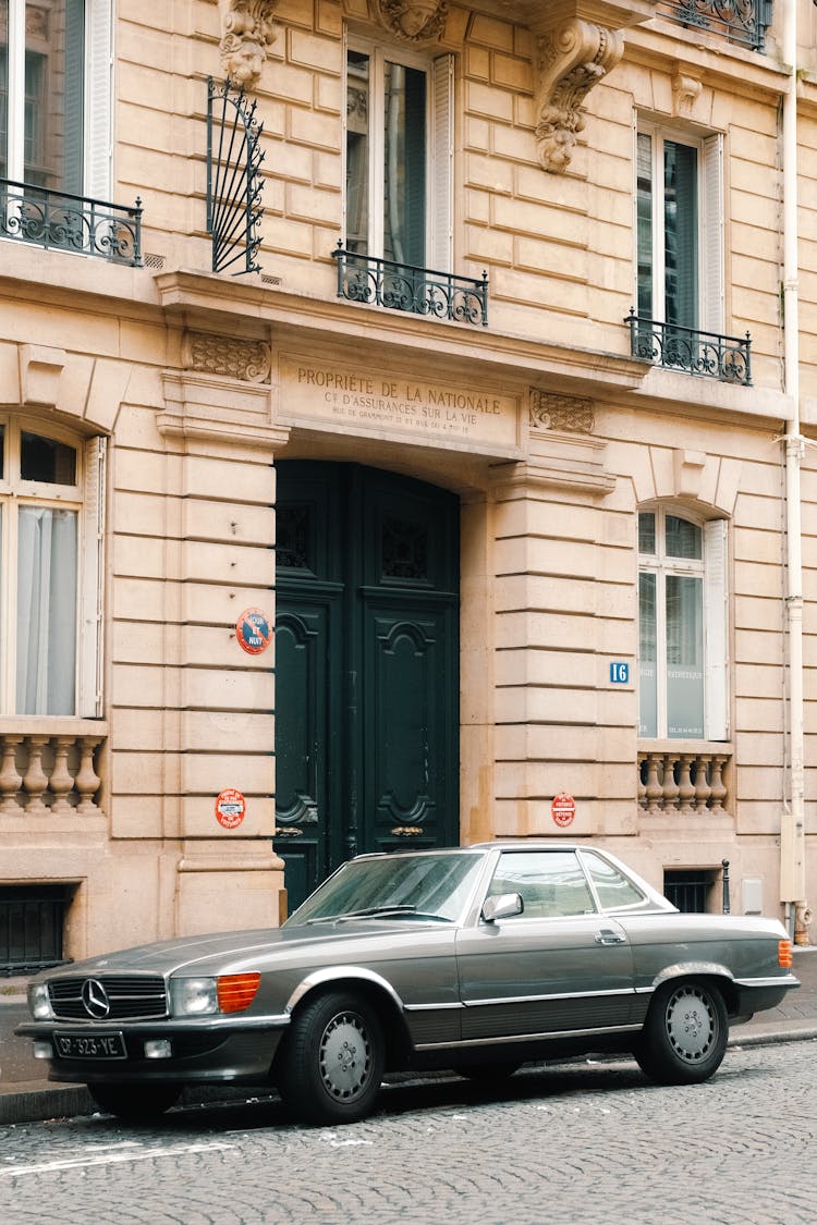 Gray Mercedes Benz Car Parked Near Building  