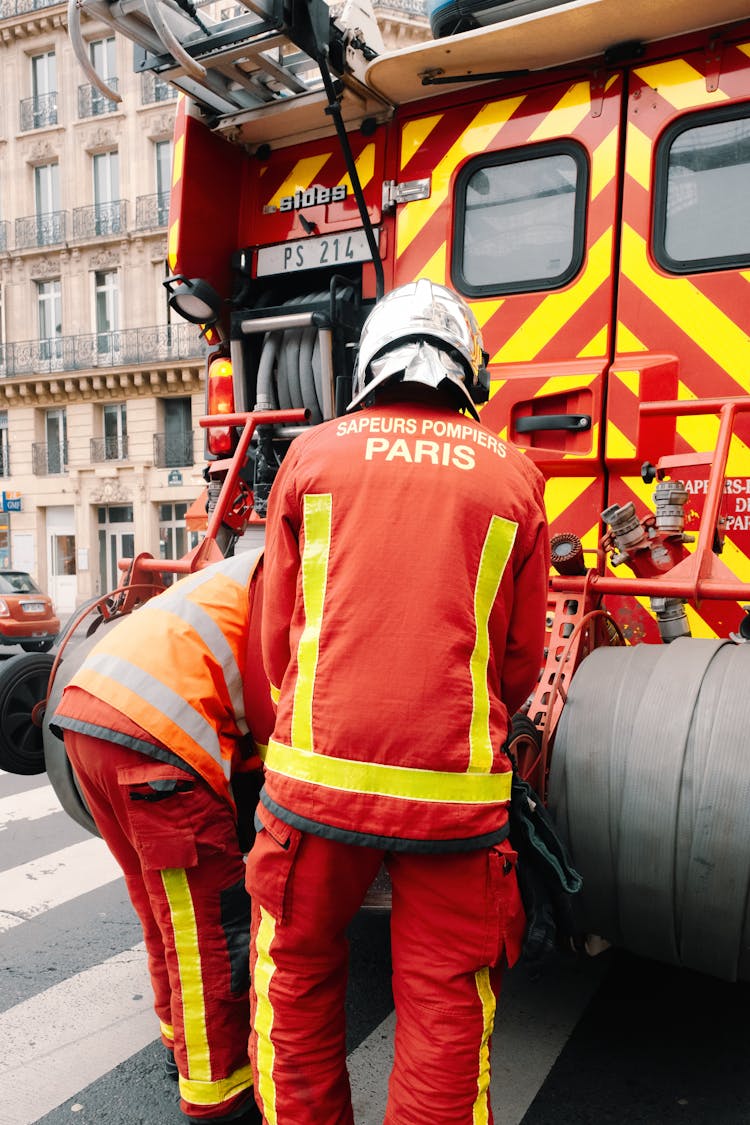 Firefighters Near Firetruck