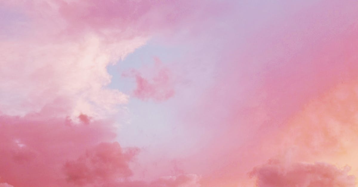 Vibrant pink and orange clouds during a breathtaking sunset sky.