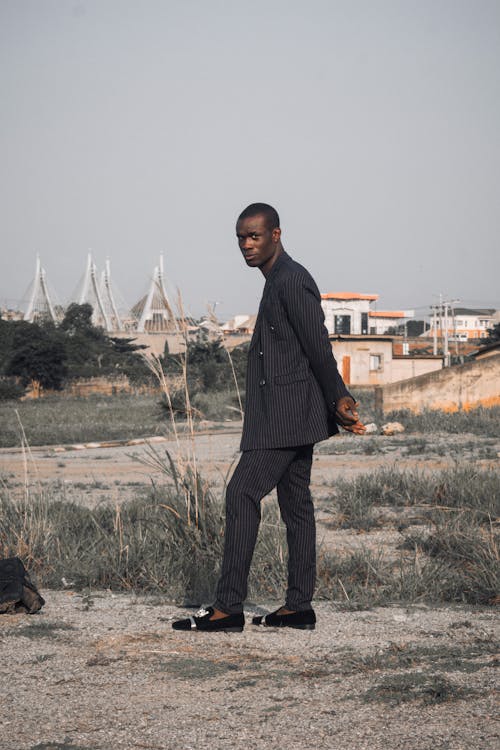Posed Photo of a Black Man in a Black Suit