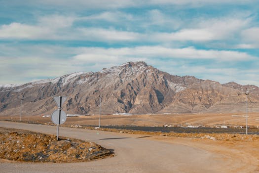 Beautiful mountain landscape with road signs in Sulaymaniyah, Kurdistan Region, Iraq.