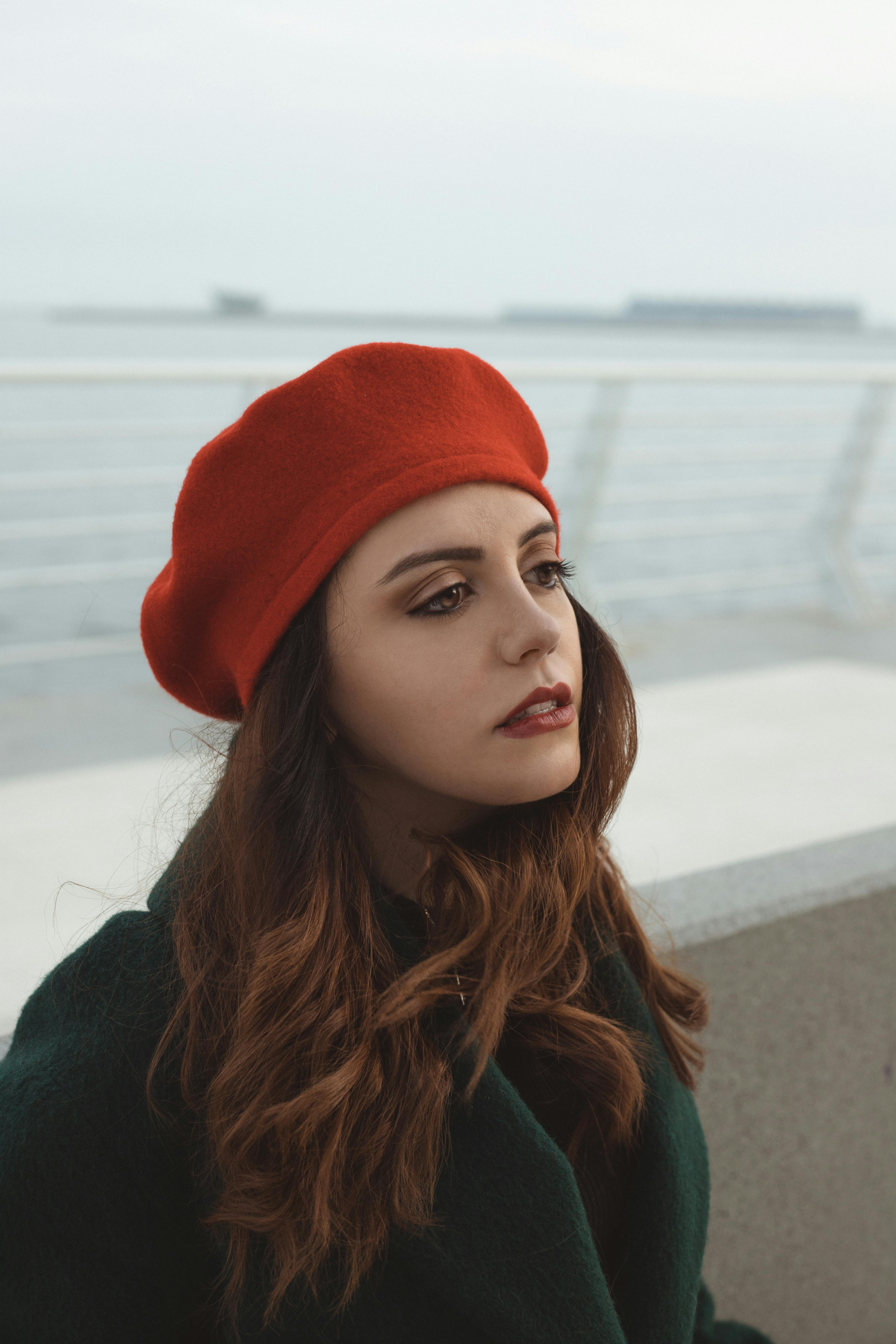 brunette in beret outdoors