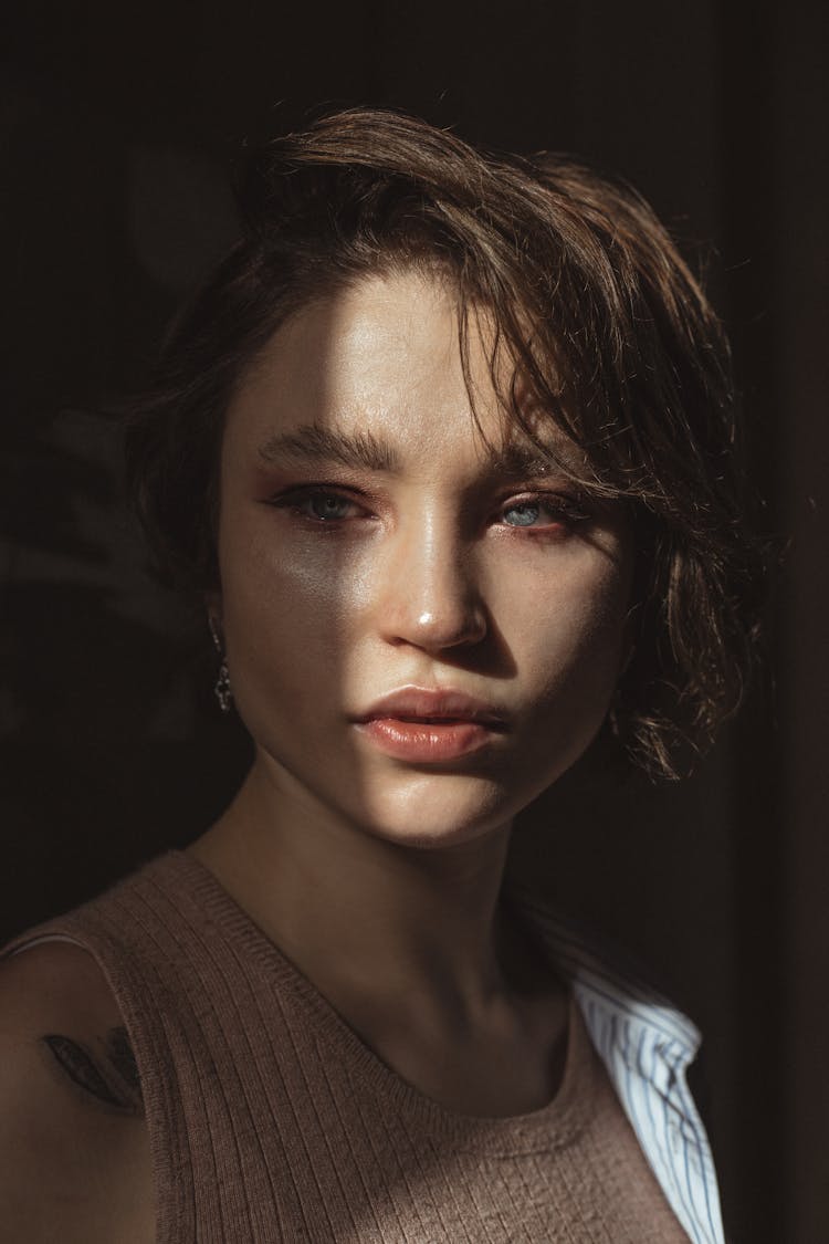 Light And Shadow On Young Woman Face