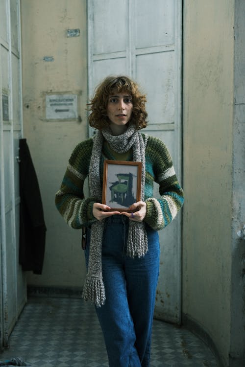 A Woman Holding a Picture