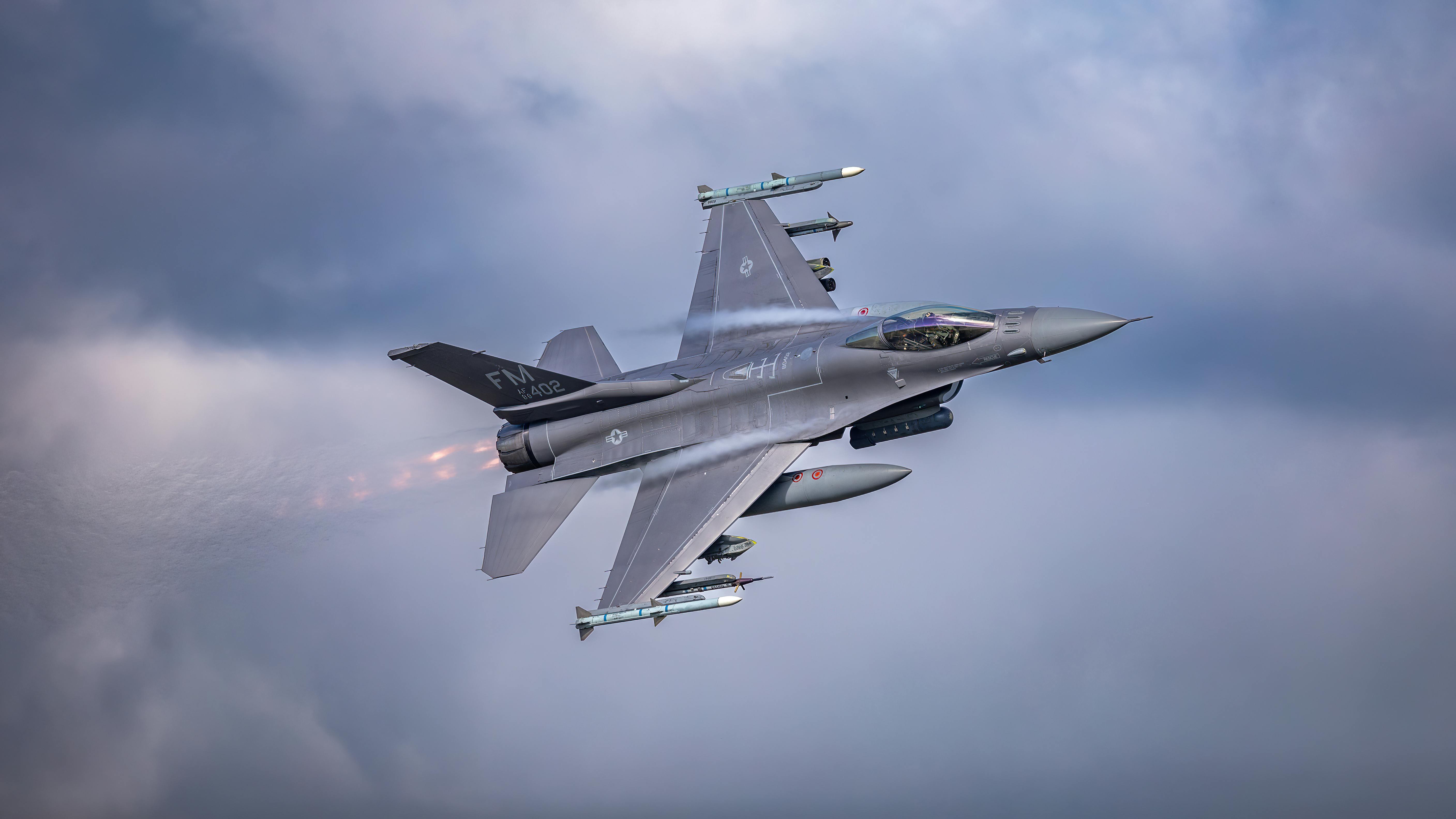 Grey Jet Plane Flying on Top of White Mountain · Free Stock Photo