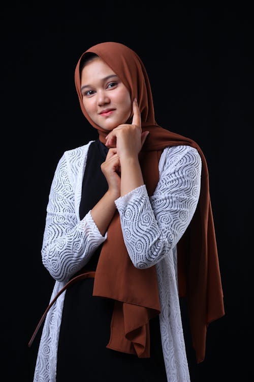 Photo of a Woman Wearing Brown Hijab