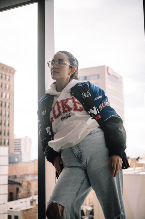 Woman in Streetwear Wearing Eyeglasses Posing 